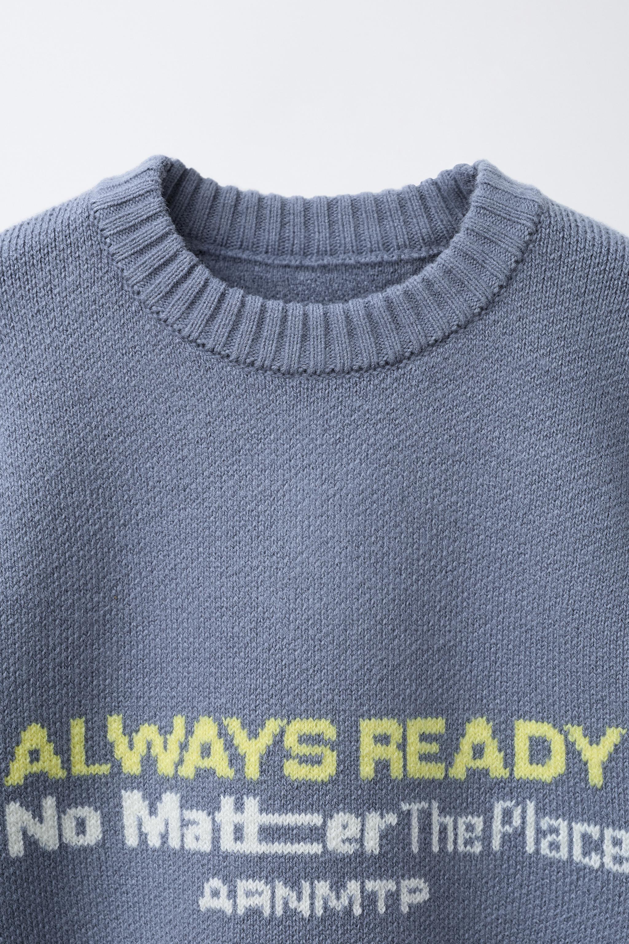 KNIT JUMPER WITH PRINTED TEXT